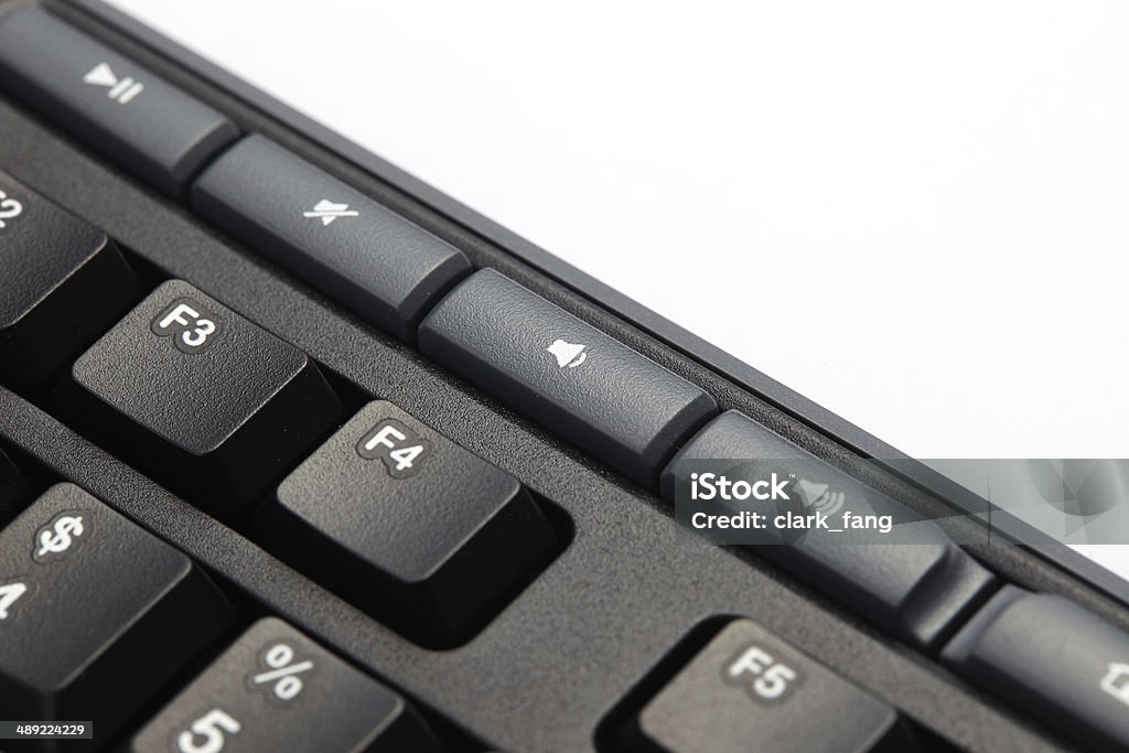 closeup of black computer keyboard closeup of black computer keyboard, volume key Alphabet Stock Photo