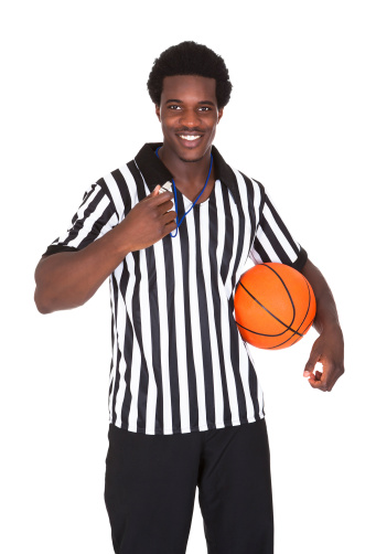 Portrait Of Happy Basketball Referee Isolated Over White Background