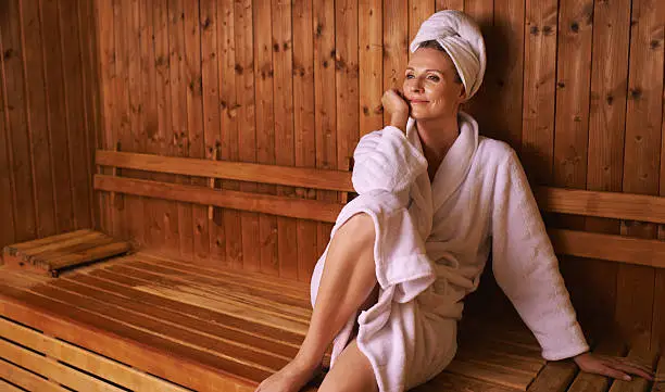 Shot of a mature woman in a sauna