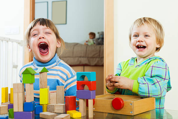 istock happy children playing in home 489226565