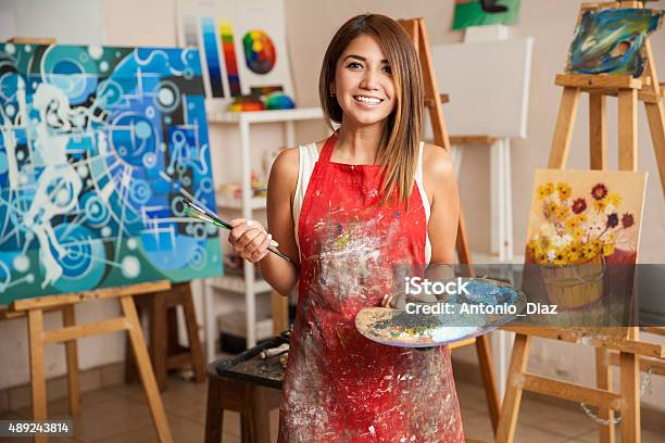 Beautiful Female Artist In Her Studio Stock Photo - Download Image Now - Artist, Painting - Activity, Painting - Art Product