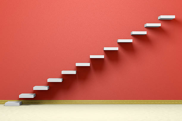 istock Ascending stairs in red empty room 489244174