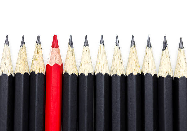 istock One red pencil among many black pencil 489244444