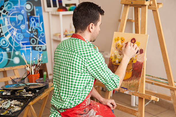 istock Male artist working in his studio 489244566