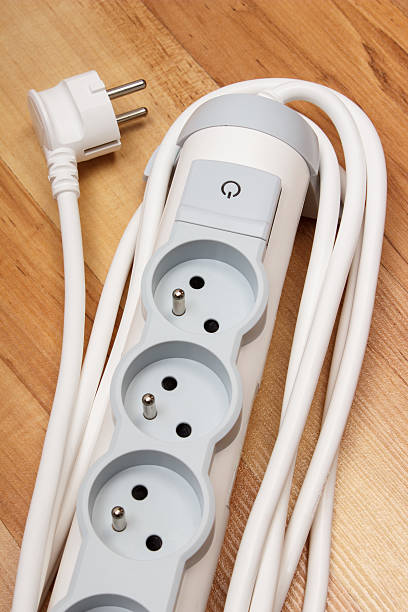 istock Electrical power strip with switch on-off on wooden floor 489245080