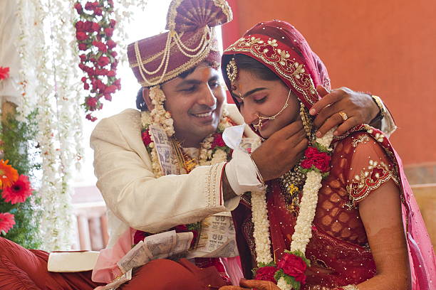 Happy Indian couple at their wedding. stock photo