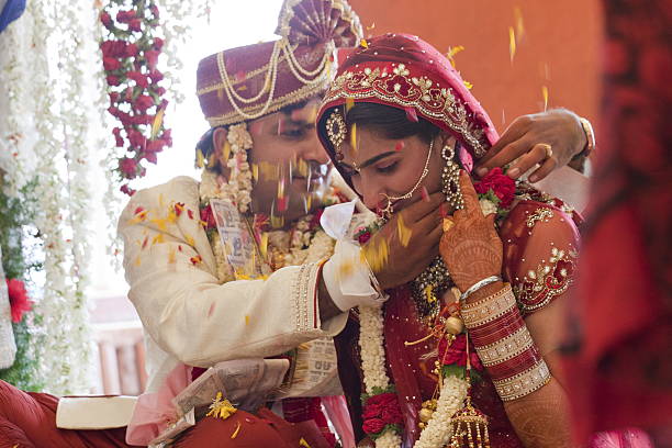 Happy Indian couple at their wedding. stock photo