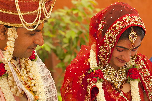 istock Happy Indian couple at their wedding. 489247634