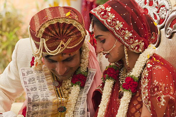 istock Happy Indian couple at their wedding. 489247786