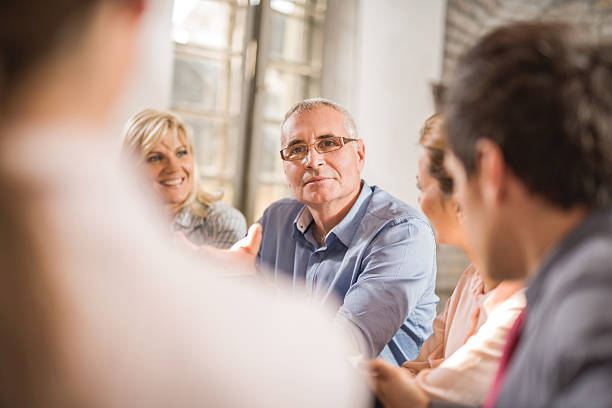 istock Group of business people discussing on a meeting. 489250024