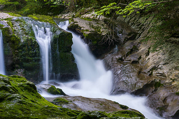 istock waterfall in the gorge Chernigovka 489250286