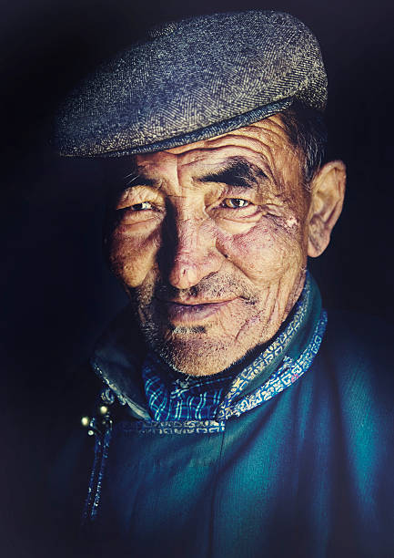 istock Mongolian Man in Traditional Dress Concept 489250582