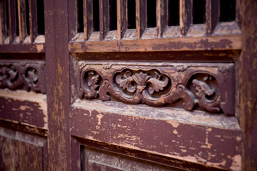 Wood worked doorway to a Traditional style home in Taiwan.