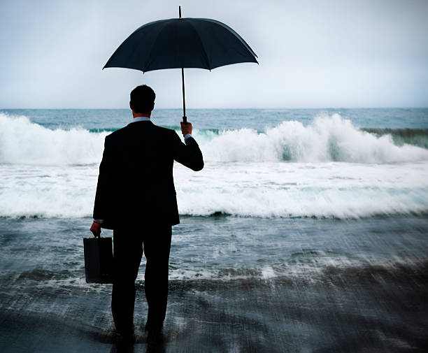 istock Businessman Facing Storm Encounter Crisis Concept 489253992