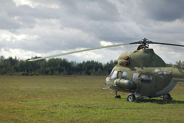 istock aircraft helicopter blue sky on the ground 489254012