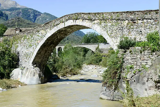 Roman bridge at Giornico on Leventina valley, Switzerland