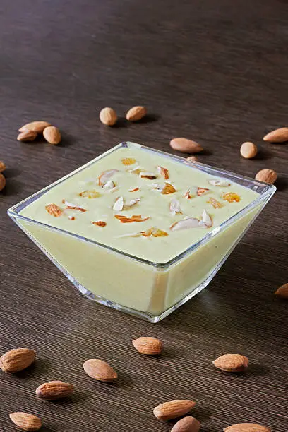 Basundi is a rich, creamy, thickened milk, flavored with saffron & nuts. In North India, a similar dish goes by the name "rabri".