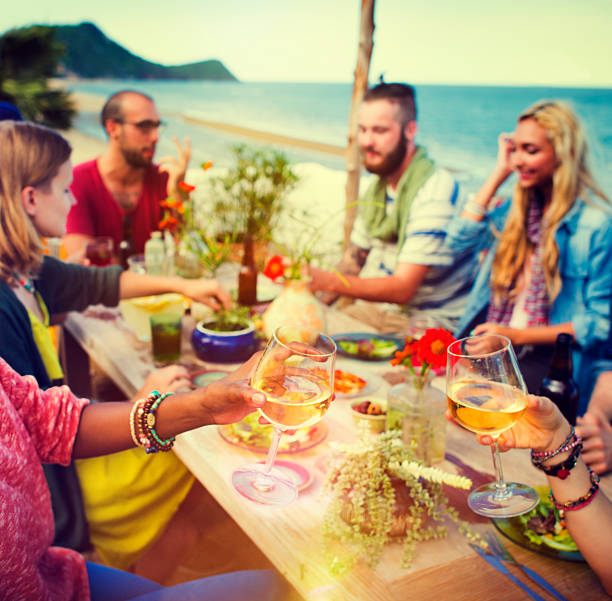 istock Beach Cheers Celebration Friendship Summer Fun Dinner Concept 489256250