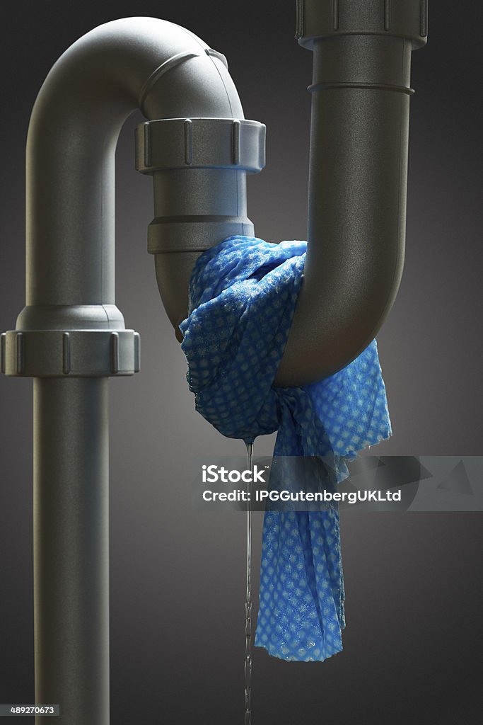 Leaking pipe with towel Damaged Stock Photo