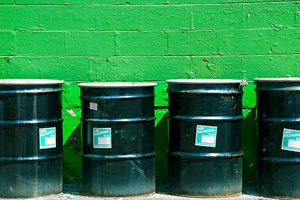 Industrial rusty metal barrel, environmental pollution, corrosion