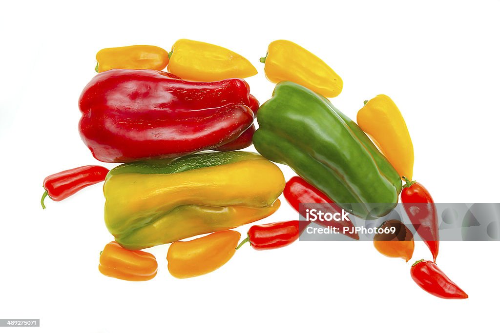 Varios pimientos en forma de pimienta - Foto de stock de Alimento libre de derechos