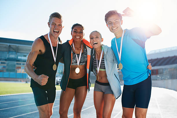 istock Team of athletes enjoying victory 489302058