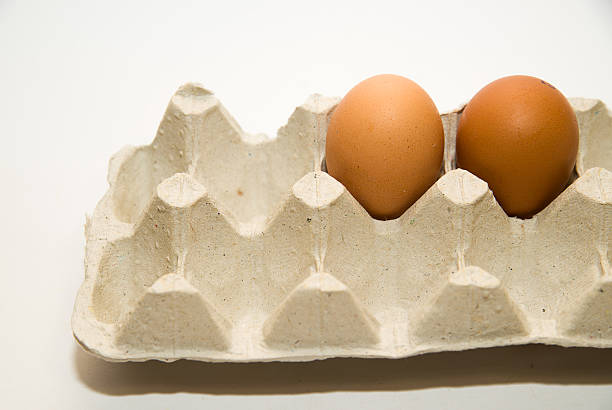 istock Chicken eggs  in the package for sale 489303918