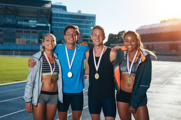 istock Group of athletes with medals 489304418