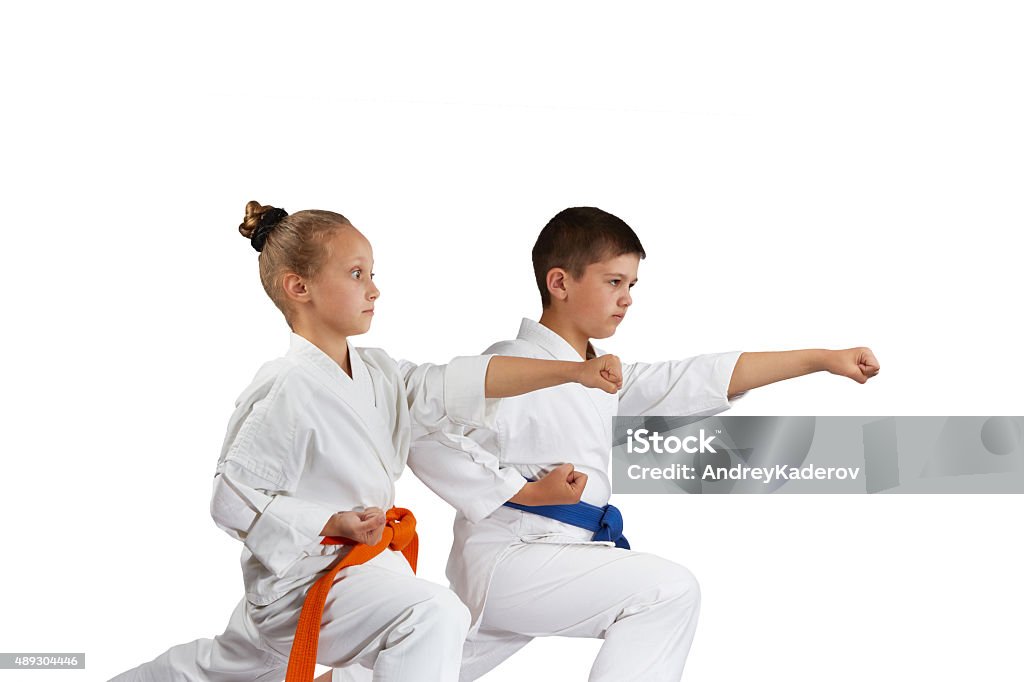 Children are beating punch hand in rack of karate 2015 Stock Photo