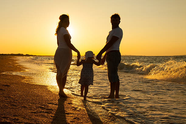 istock Family on beach vacation 489304474