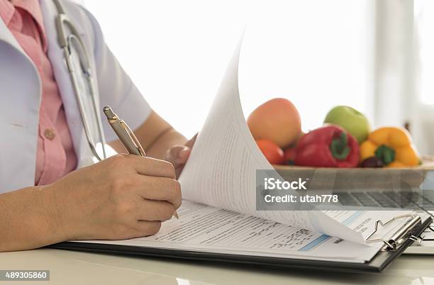 Nutritionists Stock Photo - Download Image Now - Healthy Eating, Alternative Medicine, Nutritionist