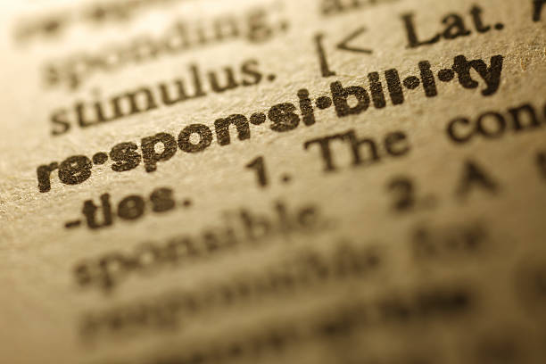 Dictionary Series - Responsibility Selective focus on the word " Responsibility "ï¼shot with very shallow depth of field. responsibility stock pictures, royalty-free photos & images