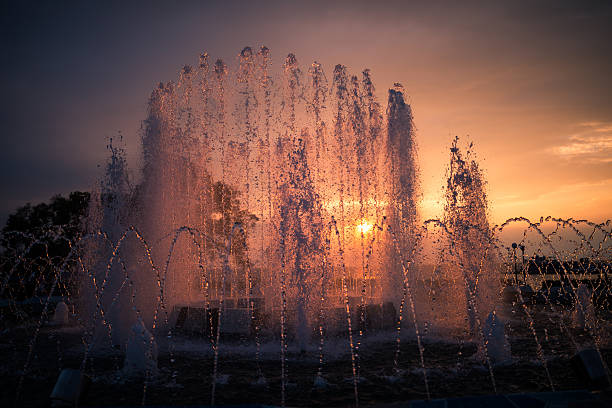 City fountain at sunset. Selective focus with shallow depth of field.