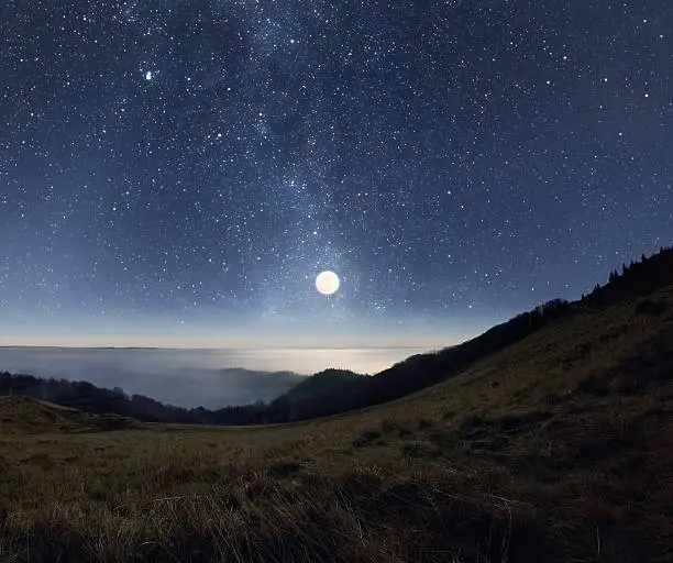 Photo of Moonrise in the mountains