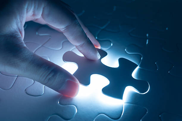 istock Hand insert jigsaw, conceptual image of business strategy 489313956
