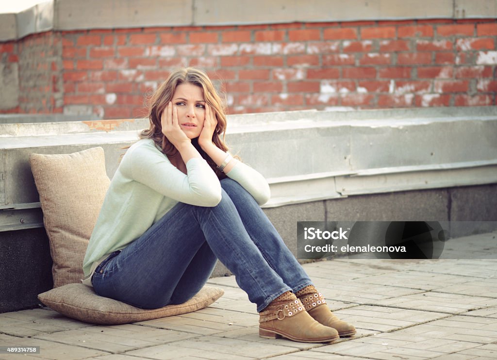 beautiful blonde woman sad 2015 Stock Photo