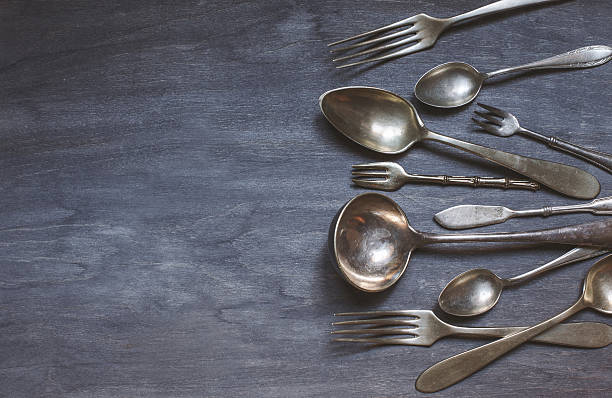 istock Antique cutlery on wooden background 489337300