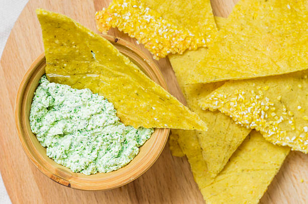 istock Homemade corn chips nachos with sauce 489339282