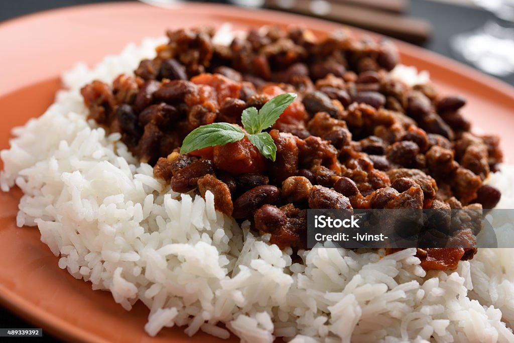 Chili con carne and rice Chili con carne with Basmati rice Rice - Food Staple Stock Photo