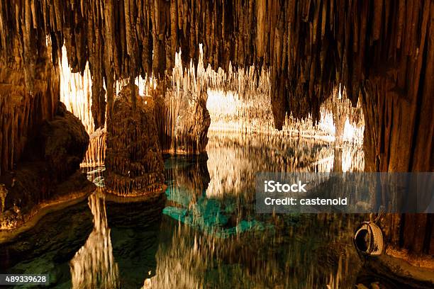 Caves Of Drach With Reflection In Water Stock Photo - Download Image Now - Cave, Bay of Water, Majorca
