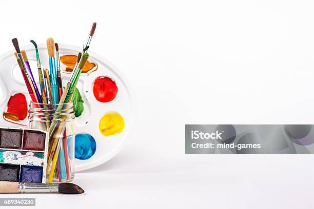 Isolated Paints Brushes Watercolour And Paints Palette Stock Photo - Download Image Now