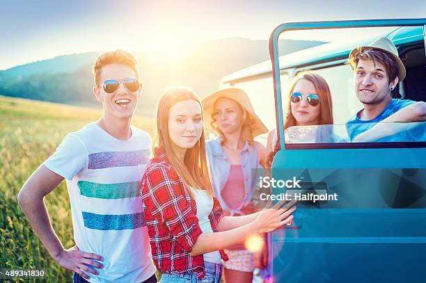 Young Hipster Friends On Road Trip Stock Photo - Download Image Now - 2015, Adolescence, Adult