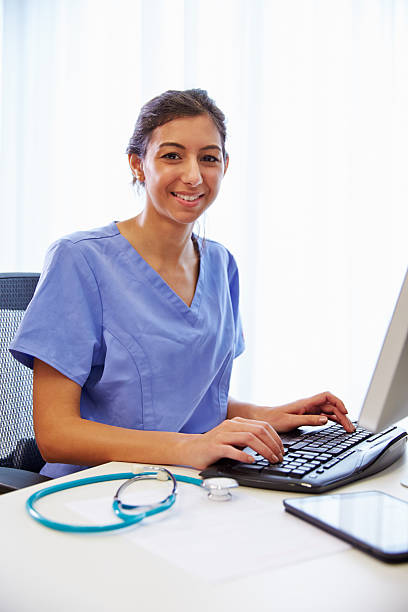 istock Portrait Of Female Doctor In Office Working At Computer 489342004