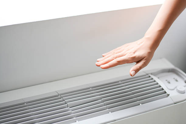 Check air conditioner heat or room temperature stock photo