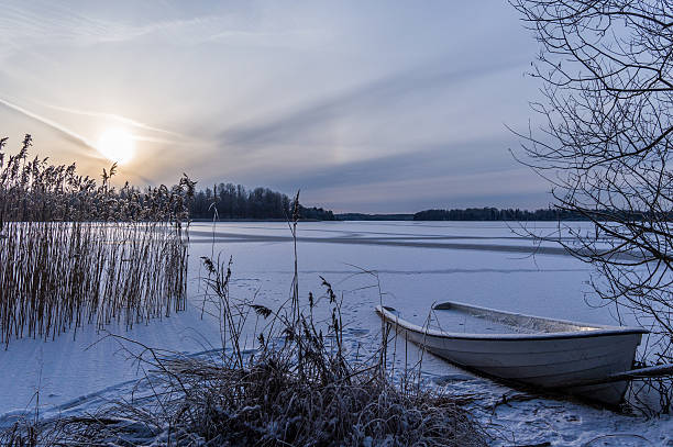 istock Sunset on frozen lake 489342708