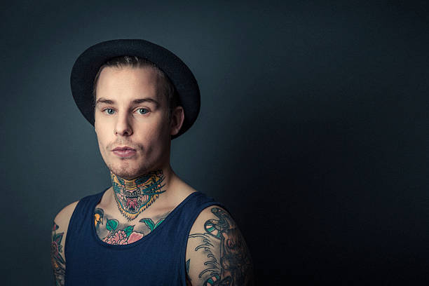 istock Portrait of confident tattooed man 489344550