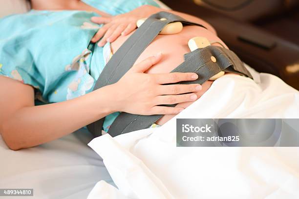 Pregnant Mother Cardio Monitoring Before Giving Birth Stock Photo - Download Image Now