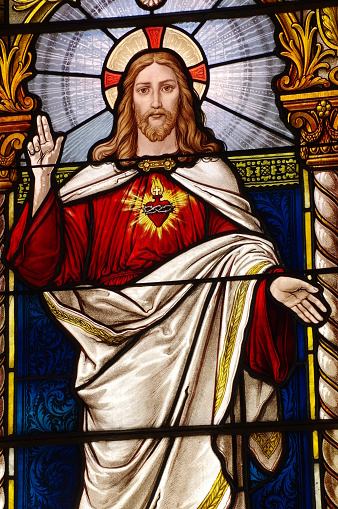Jesus crucifixion on stained glass window in Notre Dame Basilica of Quebec city