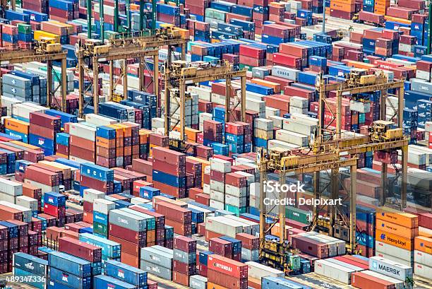 Piles Of Containers In The Harbor Of Singapore Stock Photo - Download Image Now - Crowded, Harbor, Commercial Dock