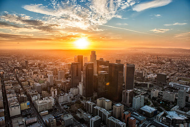 The Golden Hour Landscape view of Los Angeles during the Golden Hour, the most beautiful sunset. Helicopter point of view with many details on image. los angeles aerial stock pictures, royalty-free photos & images